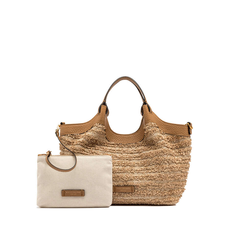 DUA versatile straw bag with leather handles and matching pouch, stylish and functional for various occasions.