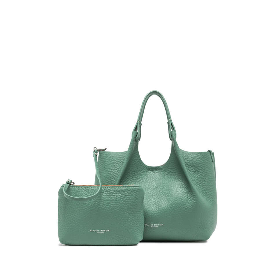 DUA green leather handbag set with a tote and matching pouch, featuring a sleek design and double-grain texture.