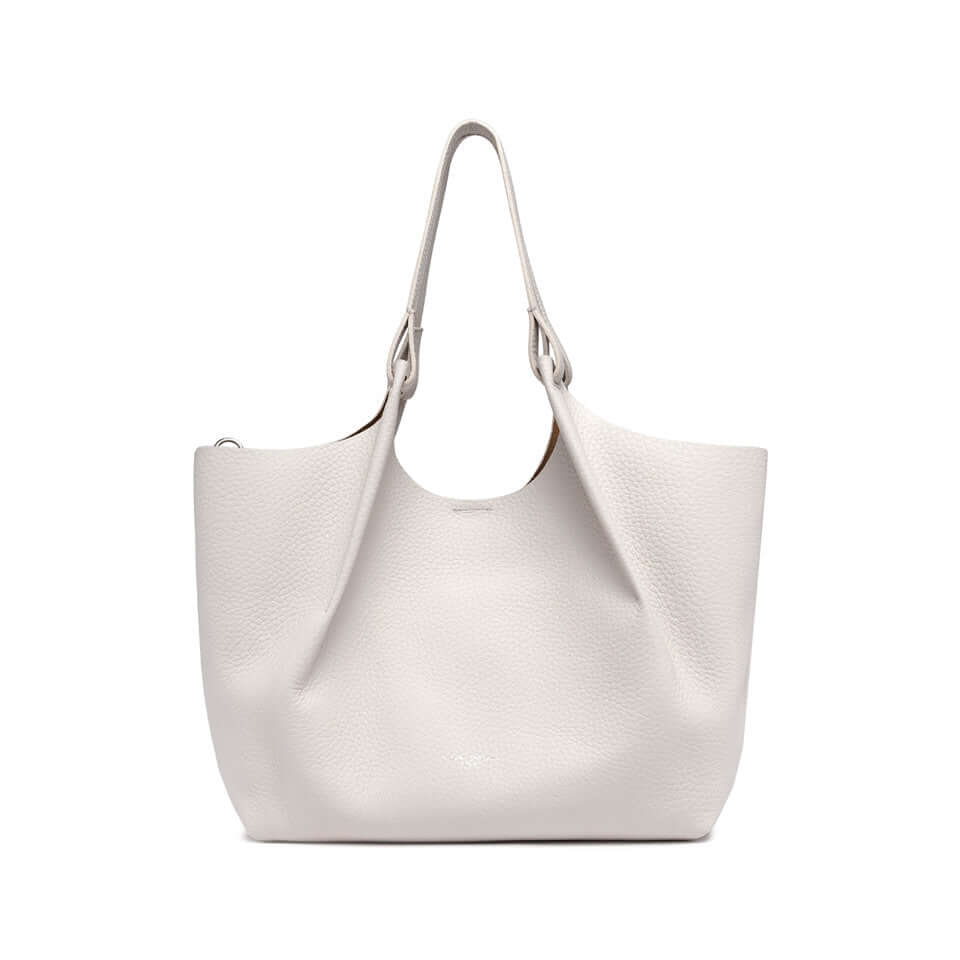 DUA white leather tote bag with sleek design, two tone handles, and magnetic closure, dimensions 34x38x16 cm.