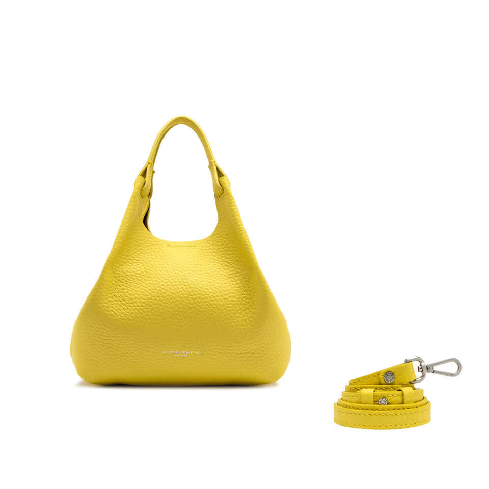 Yellow DUA handbag made of maxi grain leather with a detachable strap, perfect for enhancing any outfit.