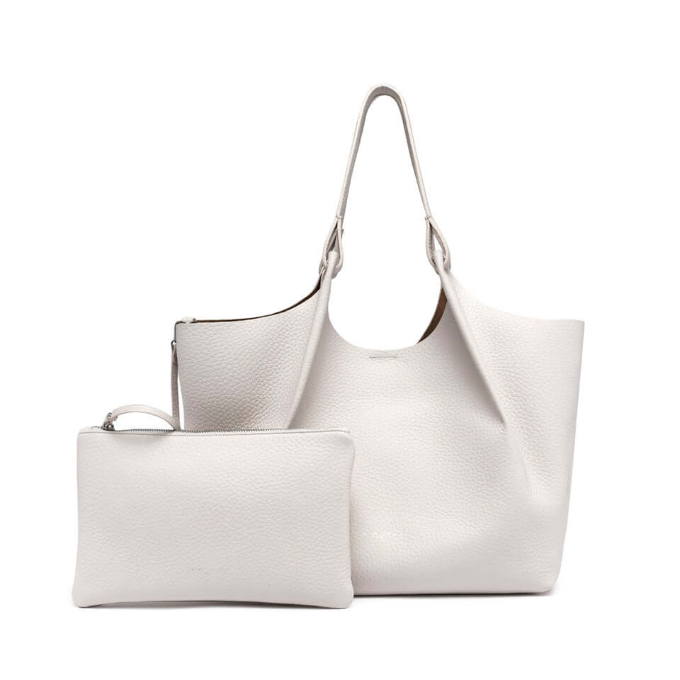 DUA contemporary leather bag set in off-white with matching pouch, perfect for elevating any outfit.
