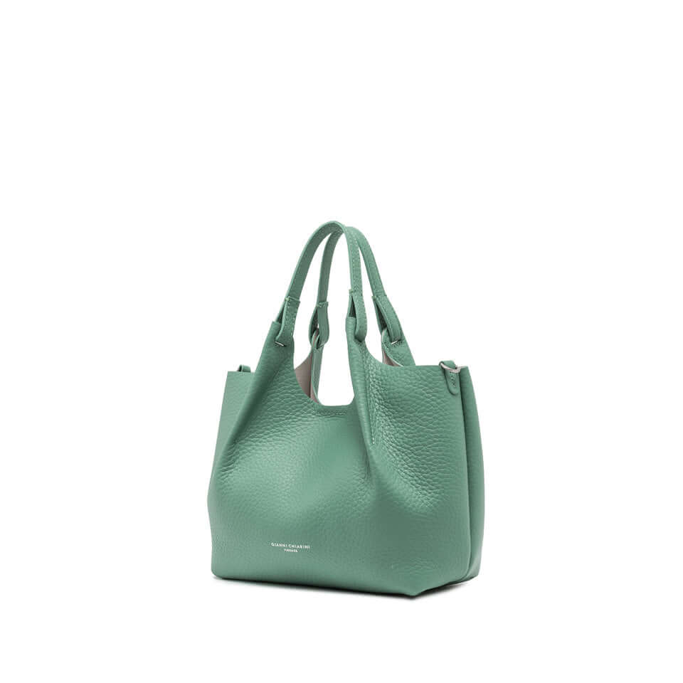 Dua brand green leather bag with contemporary design and double handles.