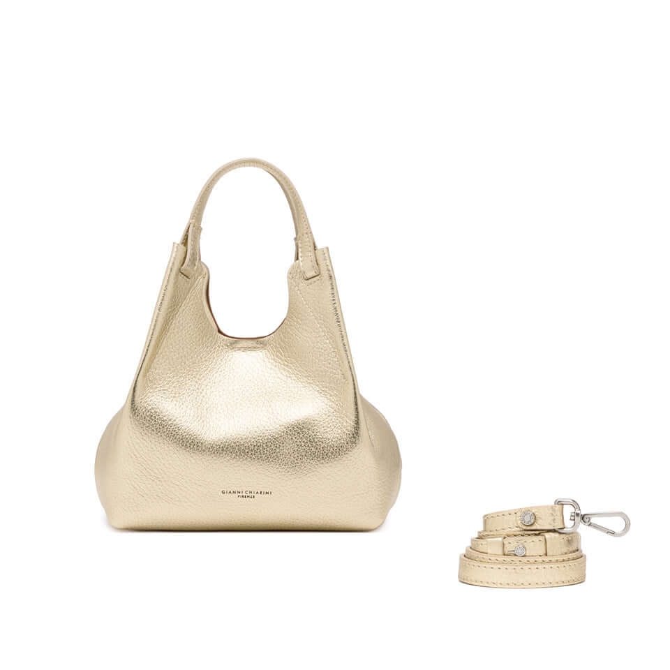 DUA handbag in metallic gold leather with dual handles and detachable strap, perfect for elevating any outfit.