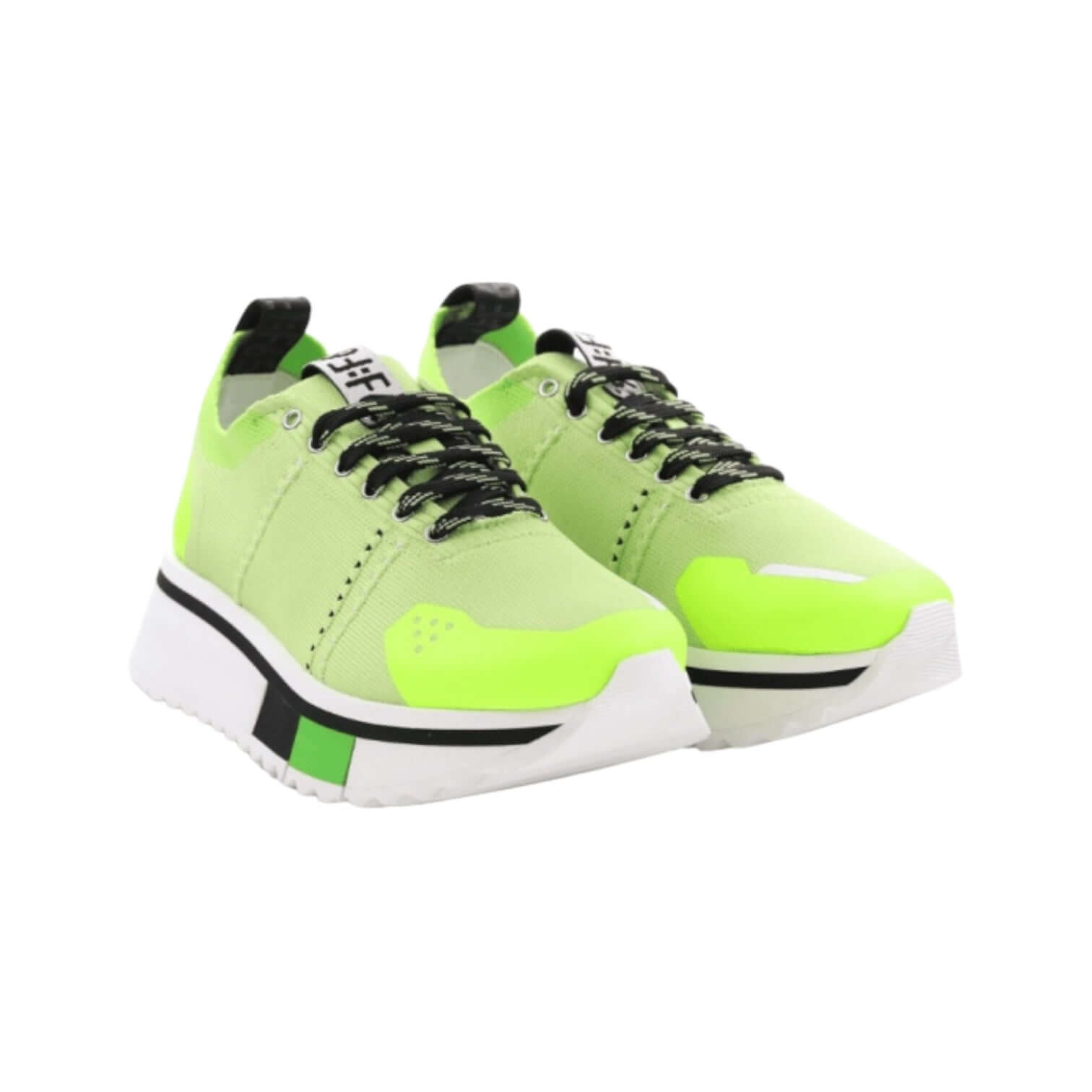 New F65 sneakers in bright green with flexible sole and modern design, perfect for versatile style.