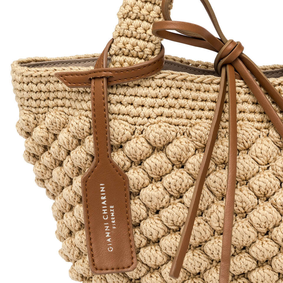 Bella handbag by Gianni Chiarini Firenze in woven fabric with bubble effect and leather details.