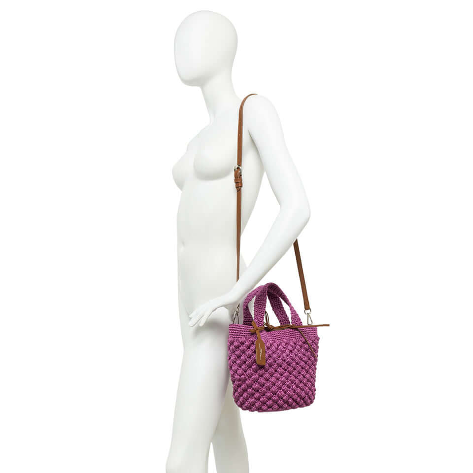 Bella double handle bag by Gianni Chiarini in bubble-textured fabric, displayed on a mannequin, featuring leather details.