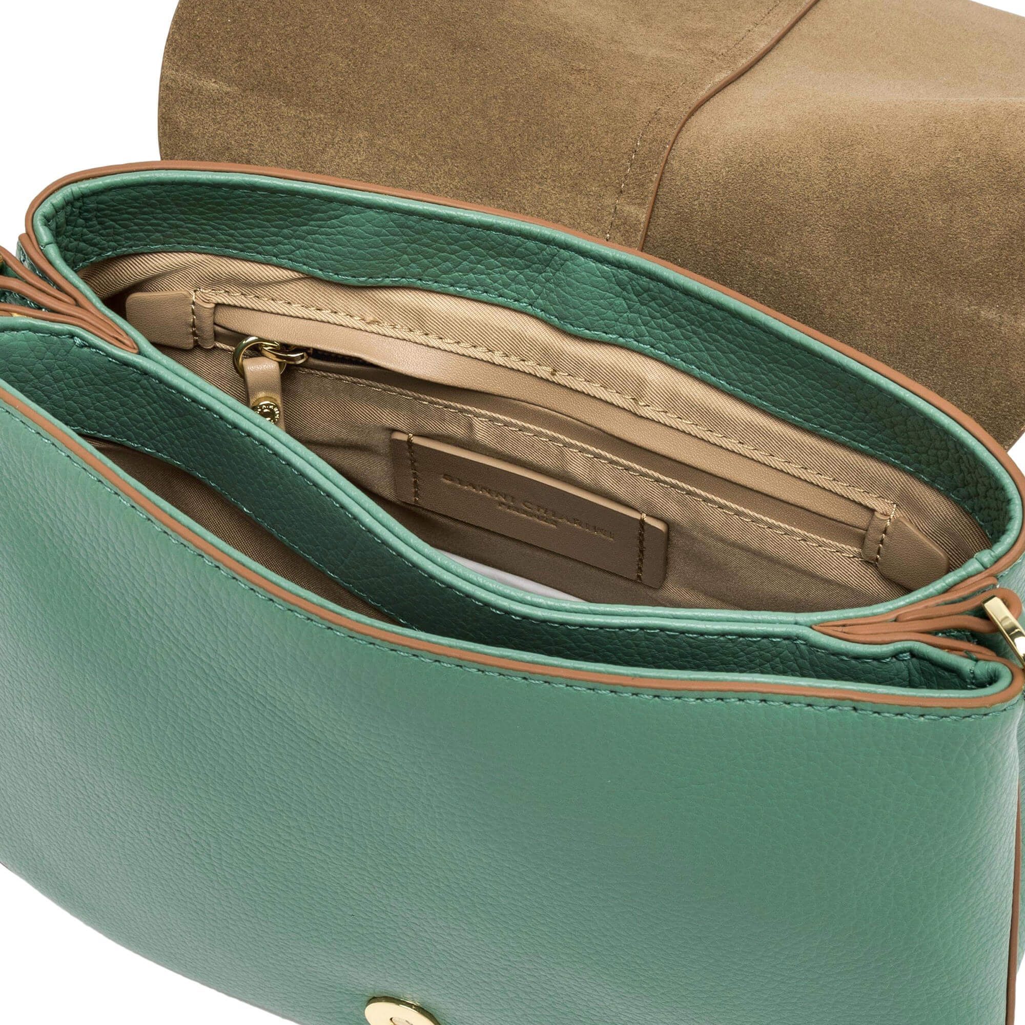 Interior view of the Helena Round bag showcasing organized compartments and chic green leather.