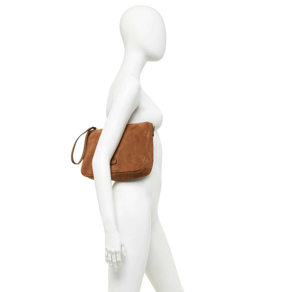 NORA POUCH by Gianni Chiarini in suede with removable wrist strap and adjustable shoulder strap.