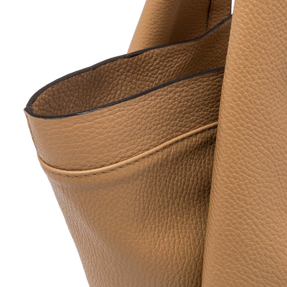 Close-up of Giulia by Gianni Chiarini Firenze, showcasing soft, hammered leather in warm tan color.