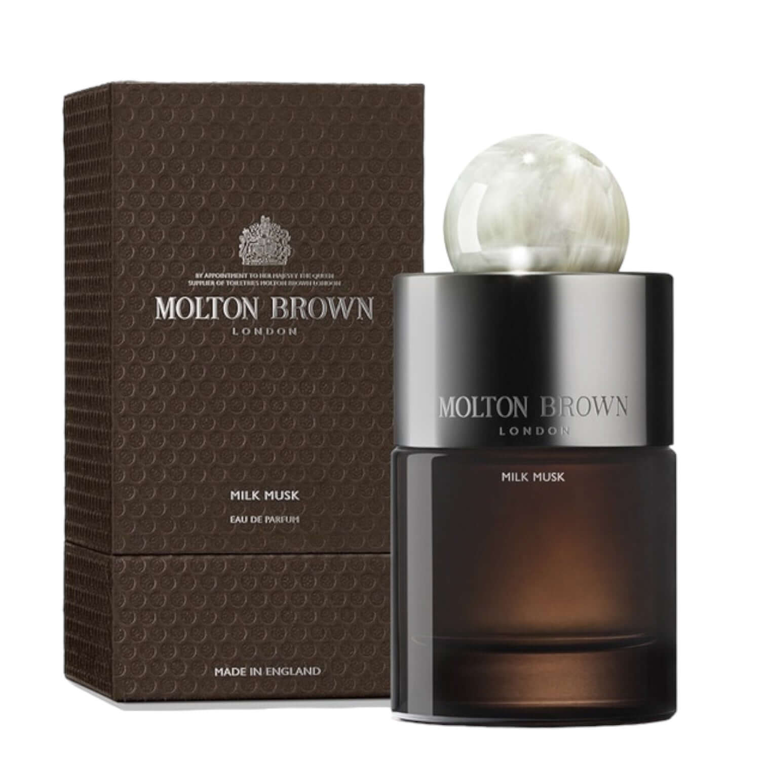 Milk Musk Eau de Parfum by Molton Brown in elegant glass bottle with unique resin cap and luxury packaging.