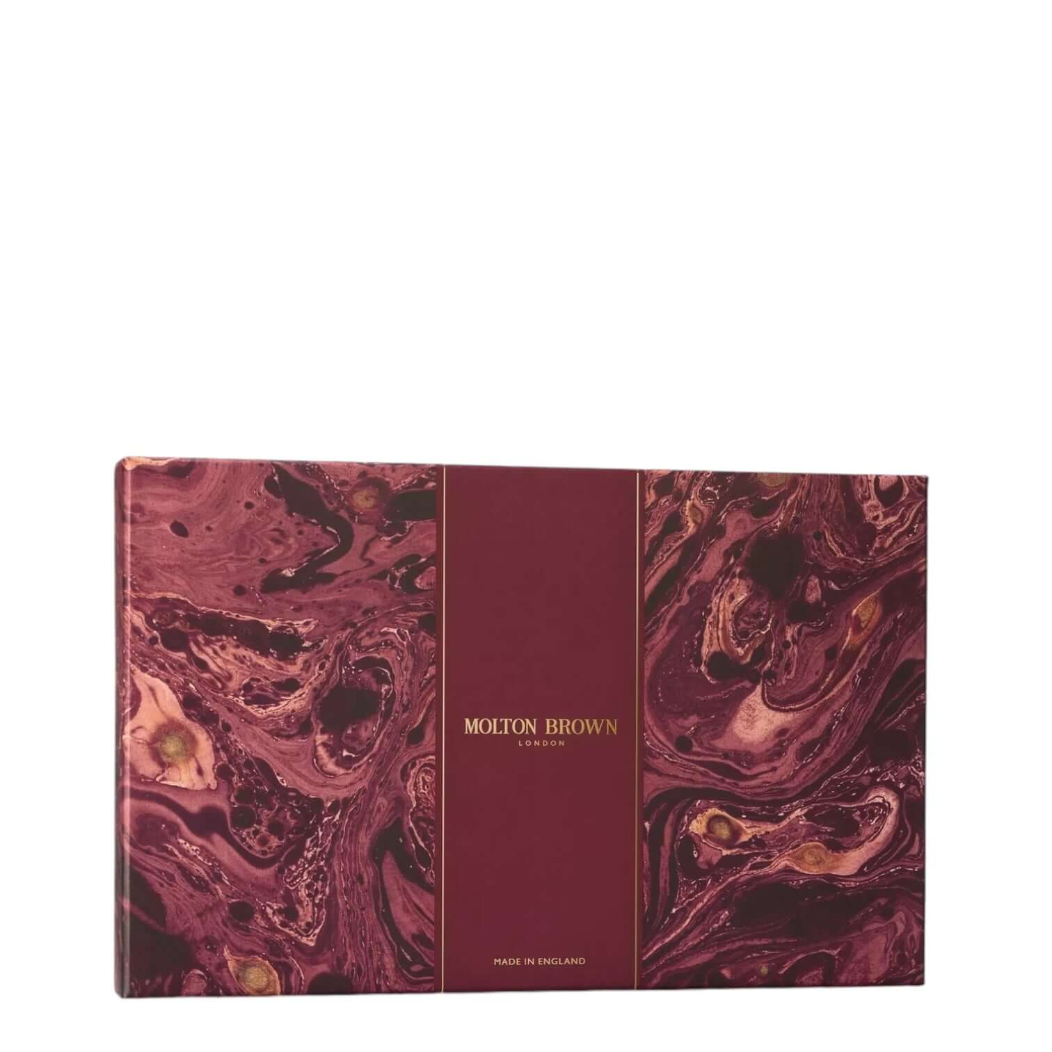 Molton Brown gift set packaging featuring elegant marbled design, perfect for luxury bath products.