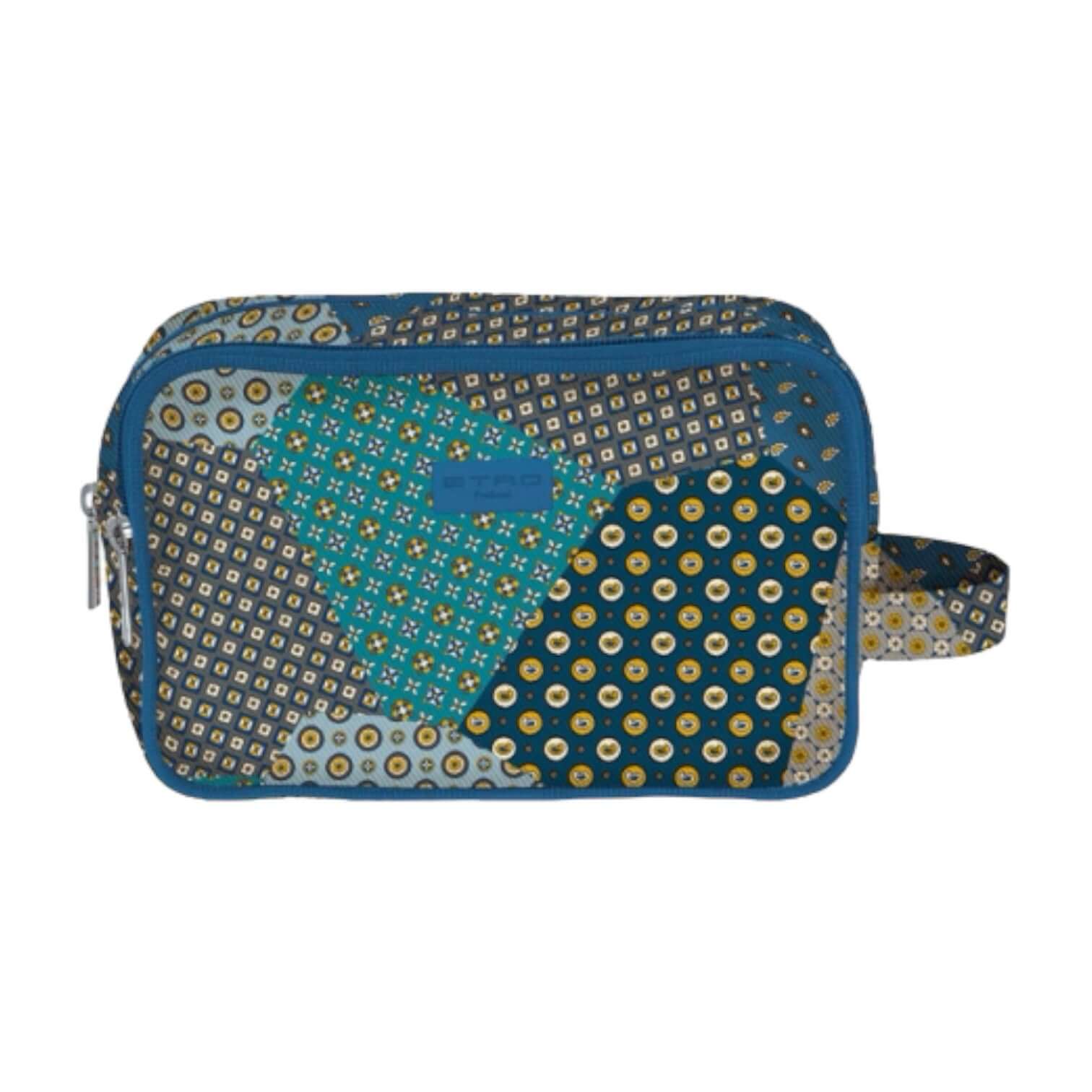 Necessaire con maniglia in tessuto fantasia, ideale per organizzare accessori da viaggio, chiusura zip e design elegante.