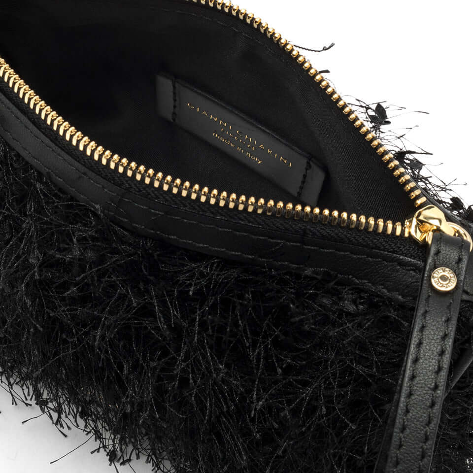 Inside view of the black Nora Pouch by Gianni Chiarini, featuring a fringed texture and zip closure.