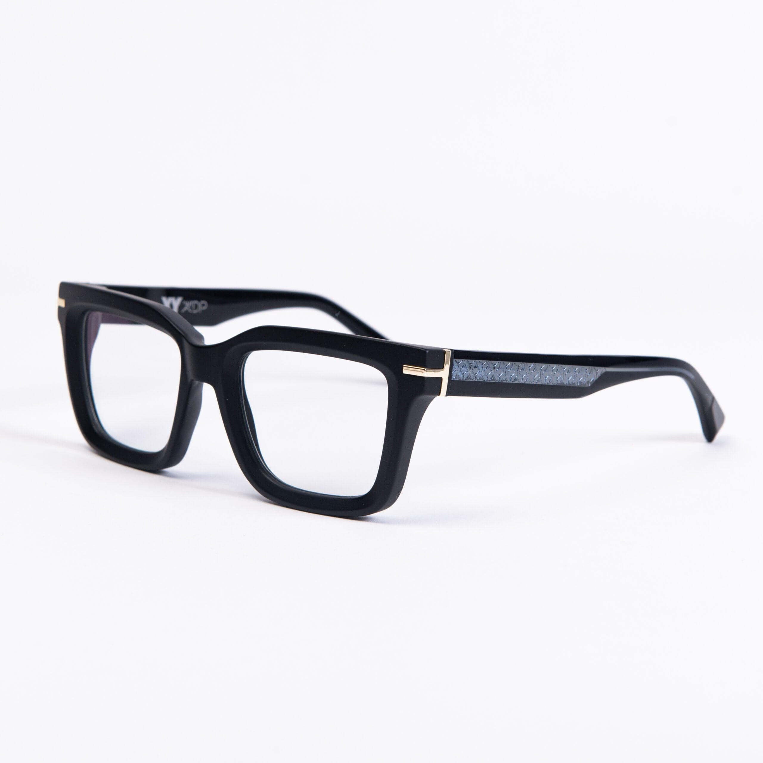 CORAL GABLE C34 occhiali con frontale nero e aste blu, collezione XY by AirDP, trasparenze e dettagli metallici.