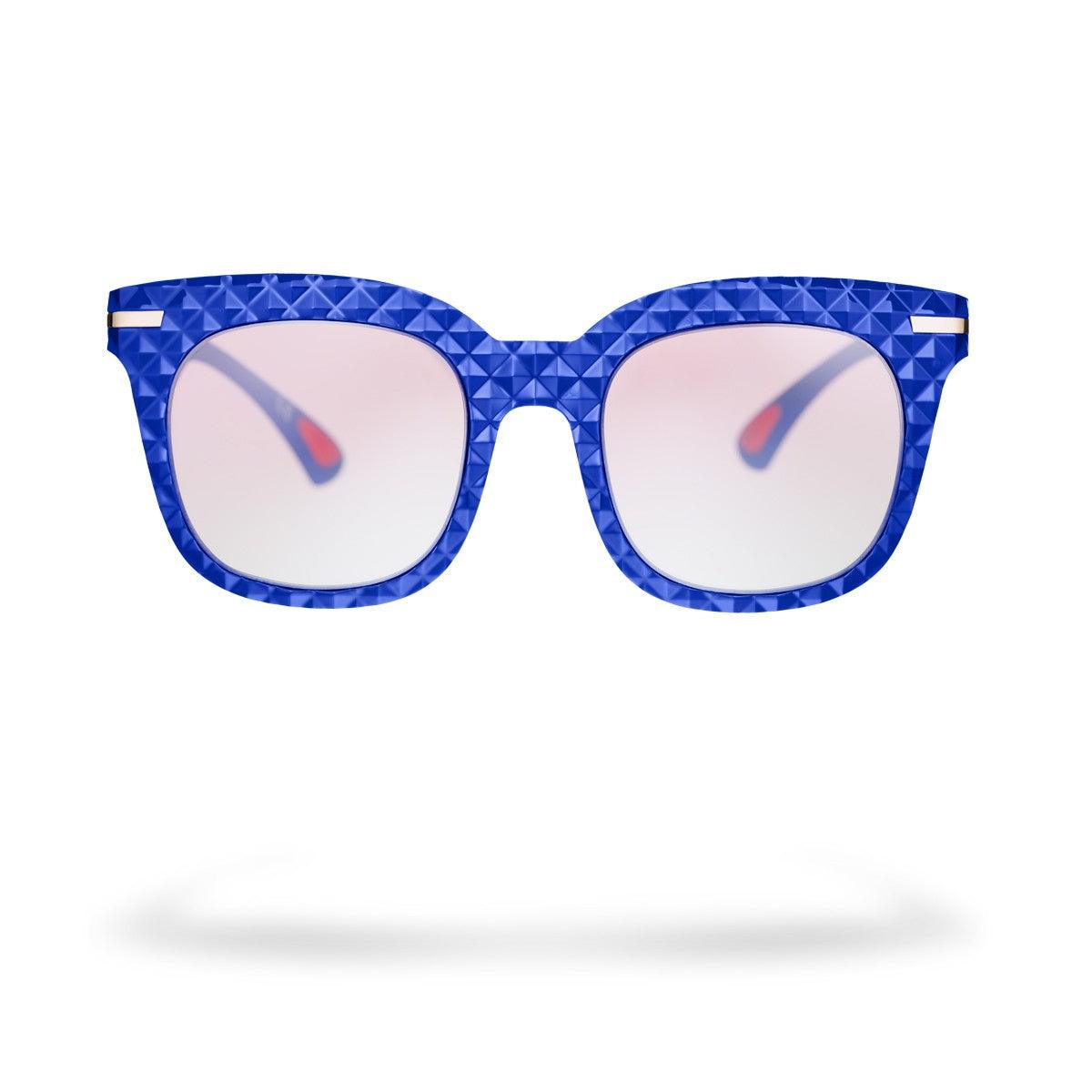 Occhiali da sole donna MARIANNA C2 con montatura blu e lenti rosa sfumate, collezione Flexo di Alessandro Del Piero.