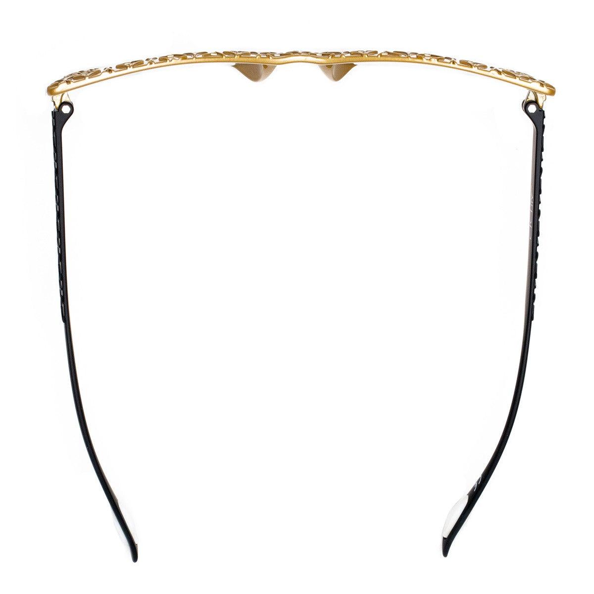 LOLA C7 BIS occhiali con dettagli geometrici e texture in oro e nero, modello elegante e accattivante.