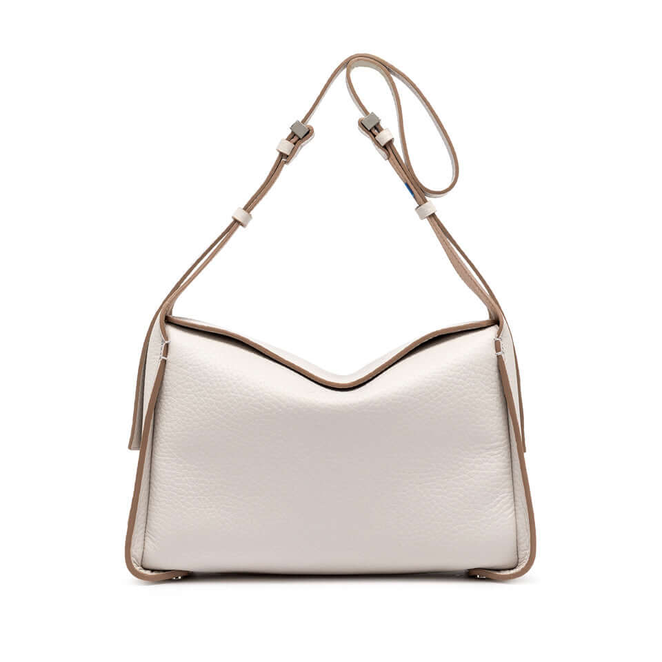 Stylish Penelope handbag in soft leather with adjustable strap and unique box architecture.