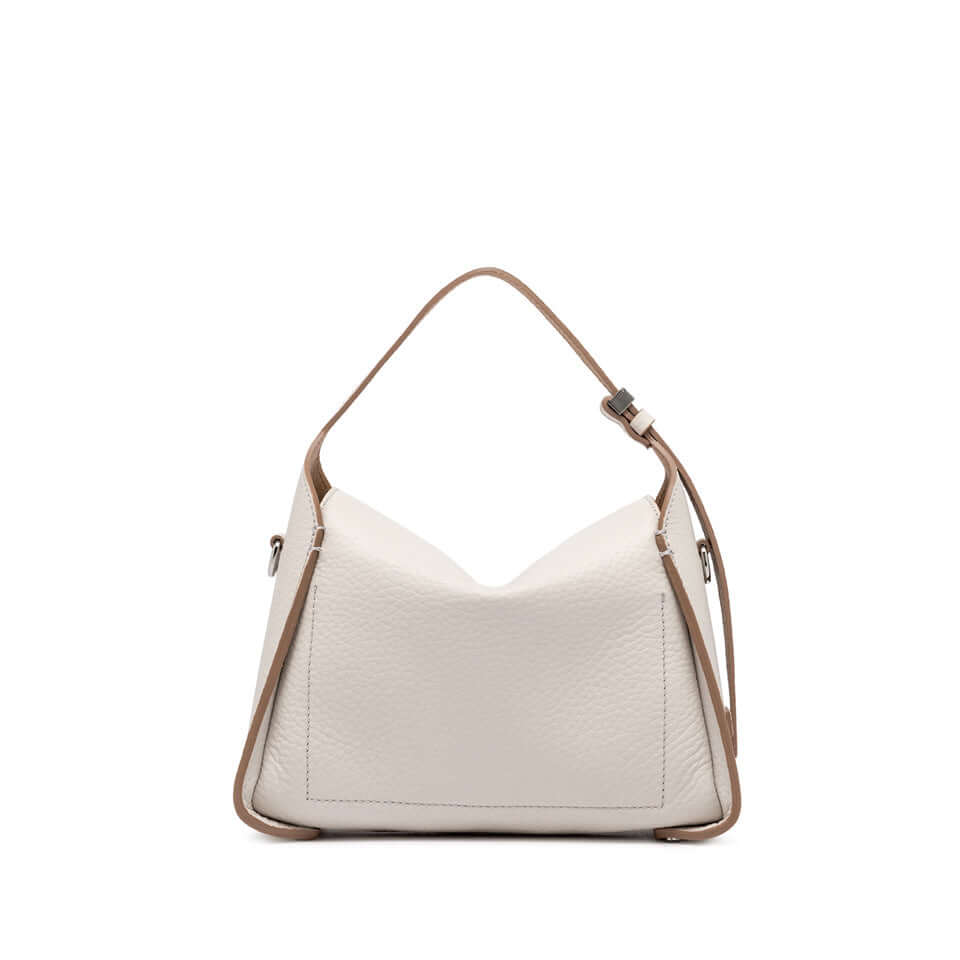 Stylish white leather handbag with a unique shape and adjustable strap.