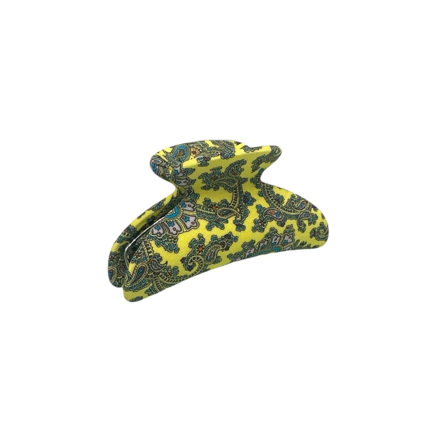 Pinza grande in tessuto giallo con motivi decorativi, realizzata in seta e acciaio per capelli eleganti e ordinati.
