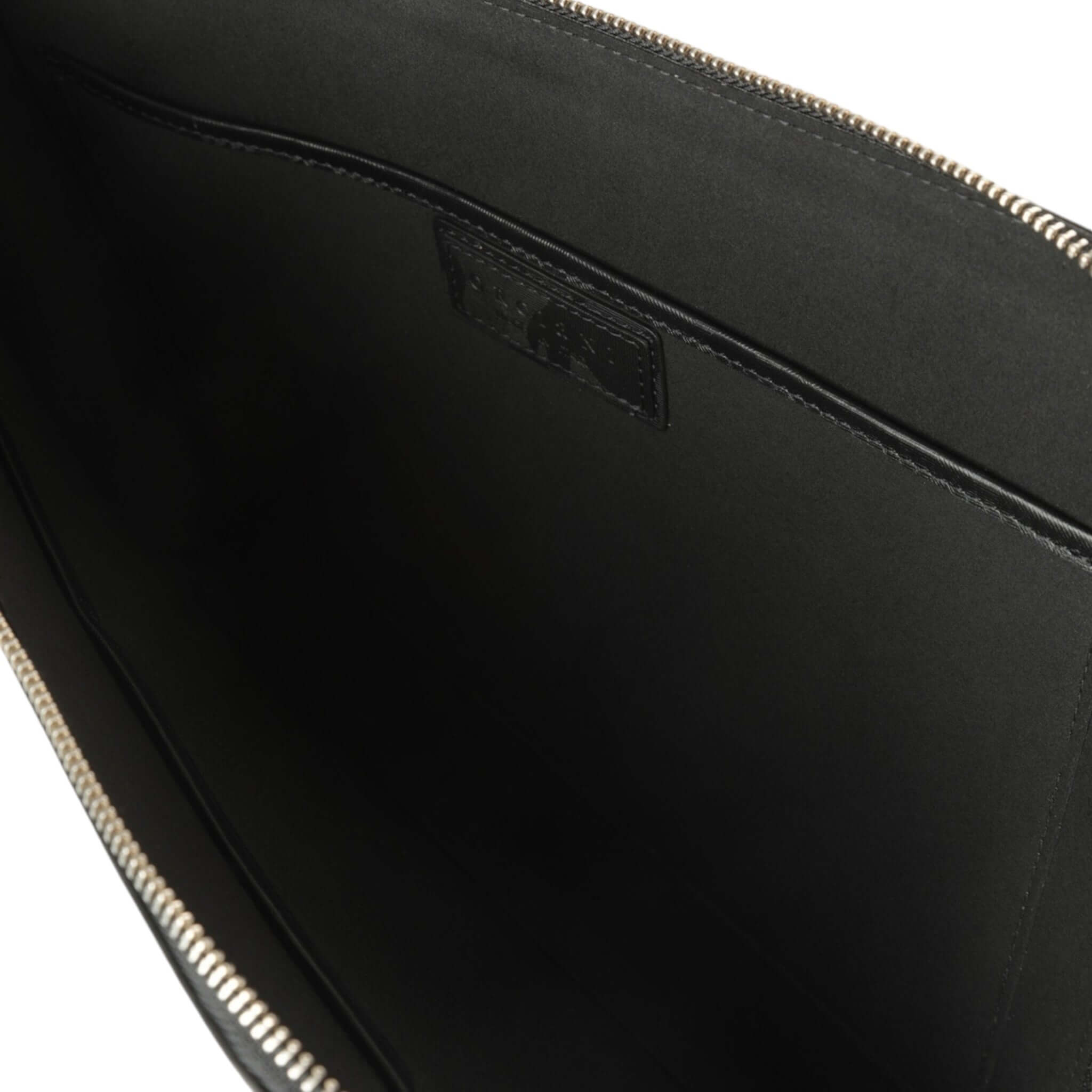 Inside view of the Micron leather document holder, featuring a spacious design and quality zipper closure.