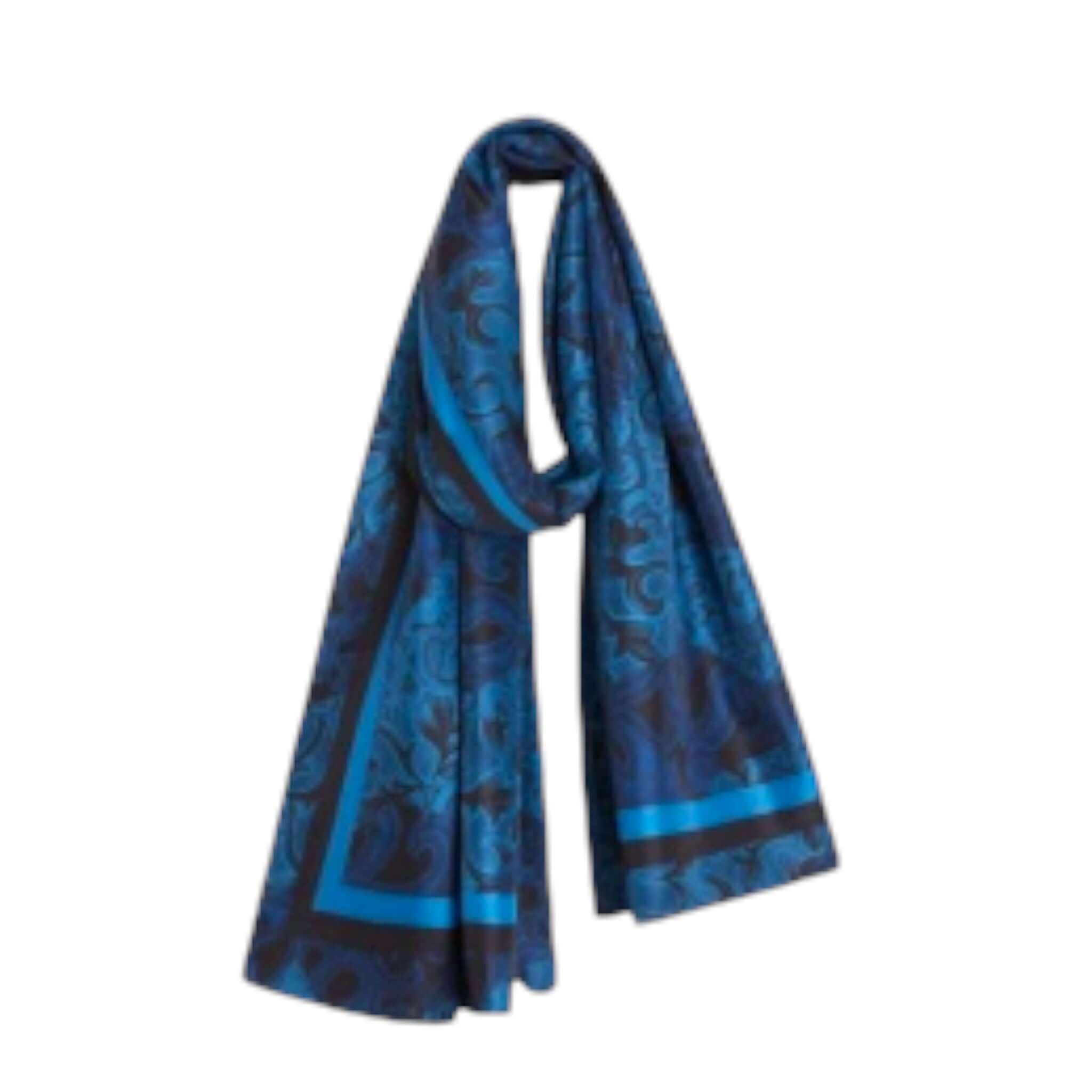 Elegante sciarpa in seta di alta qualità, blu e decorata, ideale per ogni occasione.