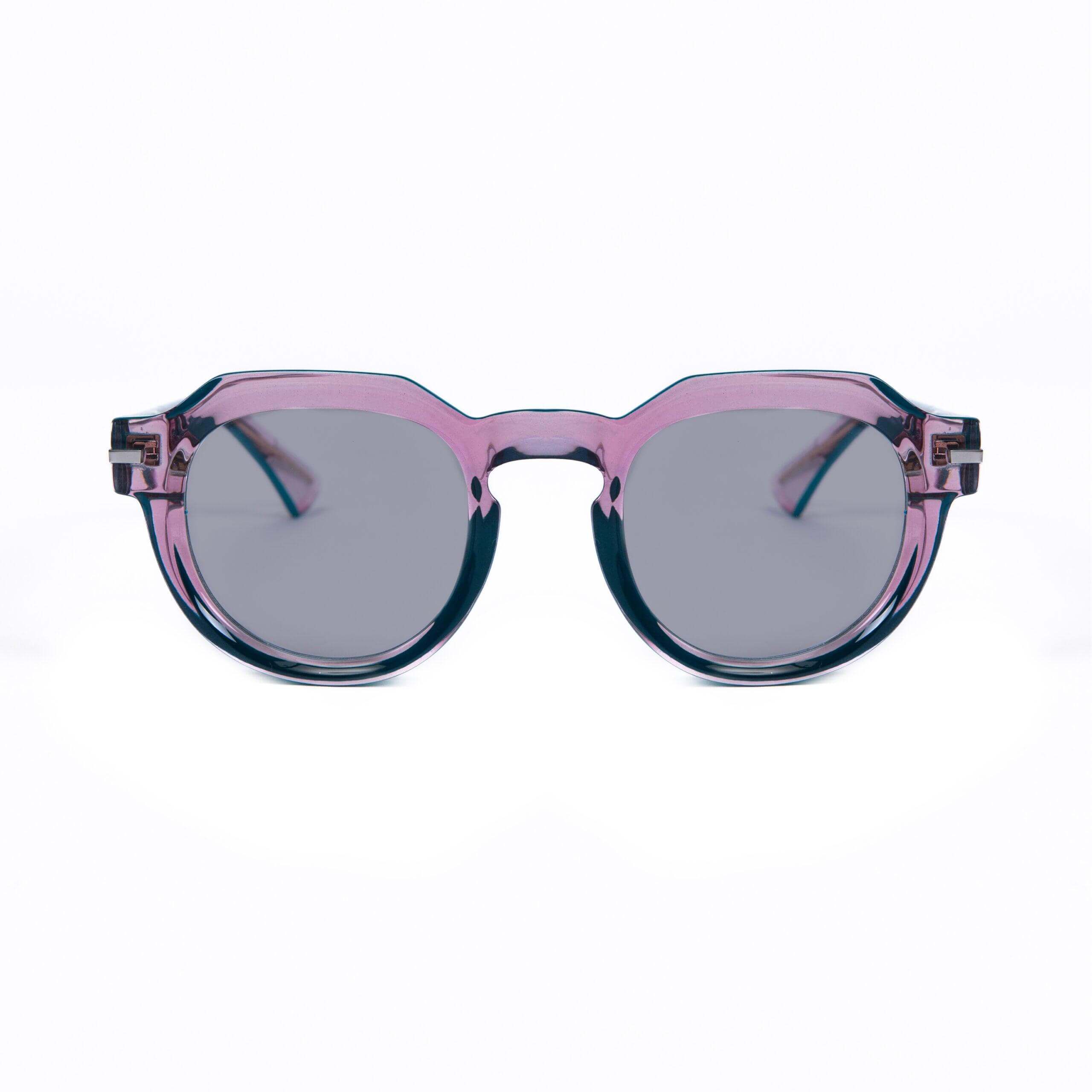 SUNNY ISLAND C12 occhiali da sole con frontale rosa trasparente e dettagli blu petrolio.