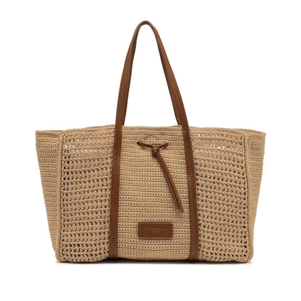 Shopping bag in crochet fabric with leather details, featuring clean lines and a stylish design.