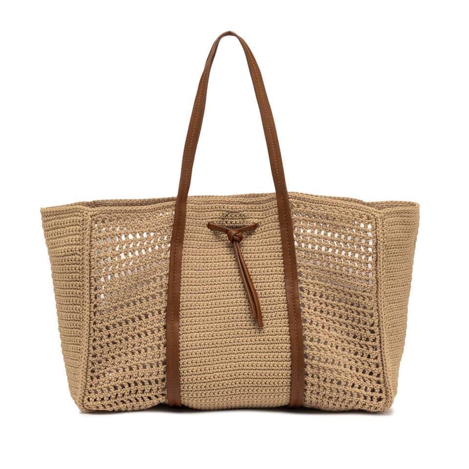 Victoria shopping bag in crochet fabric with leather details, perfect for stylish beach outings.