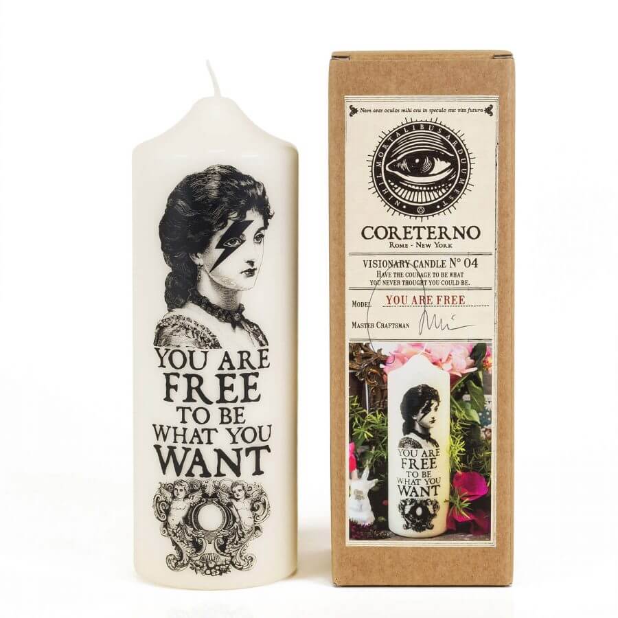Visionary Pillar Candle 'You Are Free' with artistic design and packaging presenting powerful messages of light.
