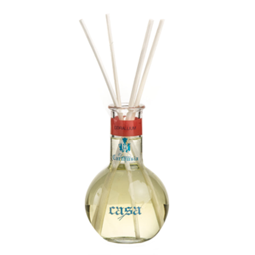 Corallium Diffusore with reeds in a glass ampoule, releasing a delicate and persistent fragrance.