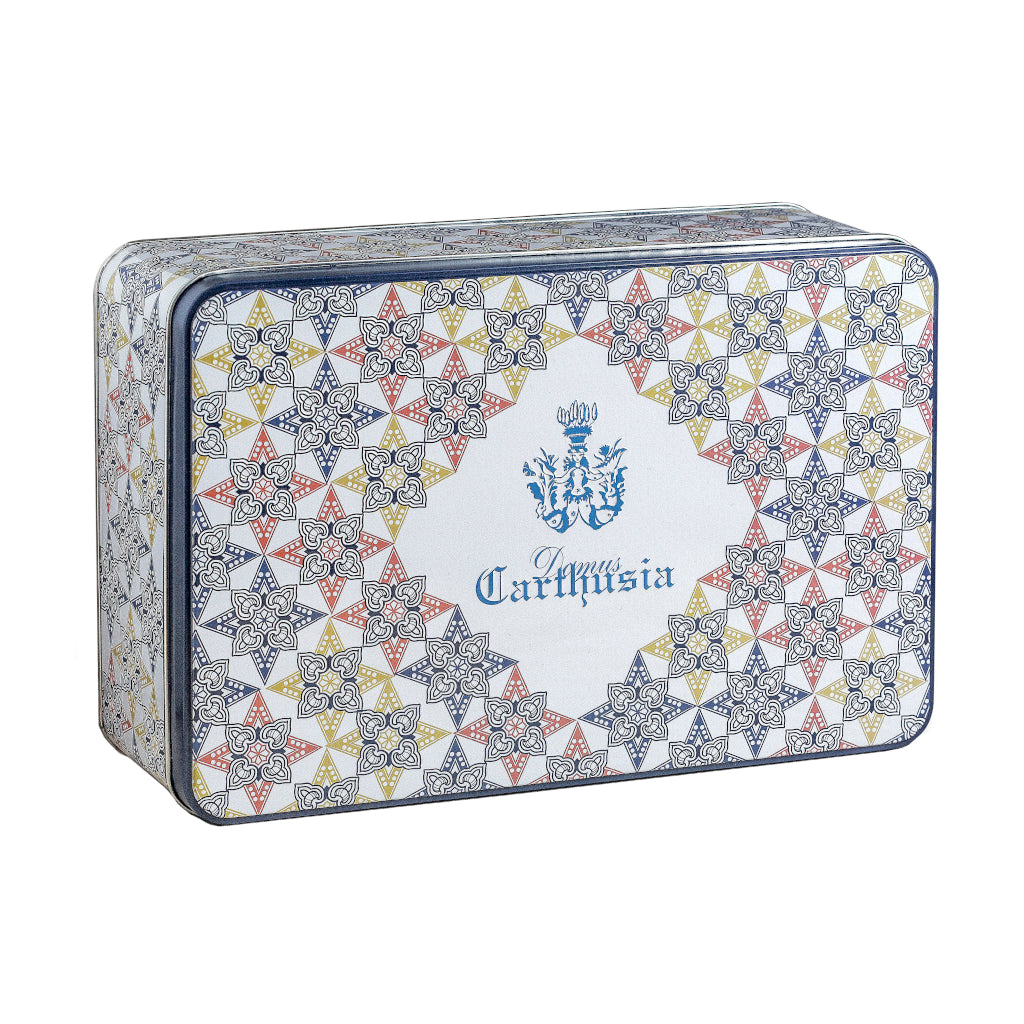 Decorative tin box featuring intricate floral patterns and Carthusia branding, ideal for gift packaging.