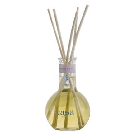 Fiori Di Capri Diffusore with decorative reeds in a stylish glass bottle, releasing a gentle and persistent fragrance.