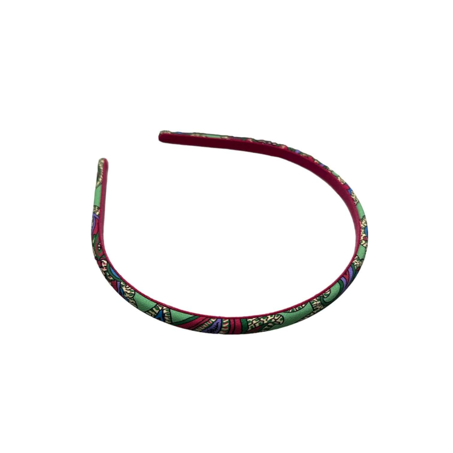 Cerchietto Sottile Fantasia in seta e poliestere, design elegante per acconciature leggere e confortevoli.