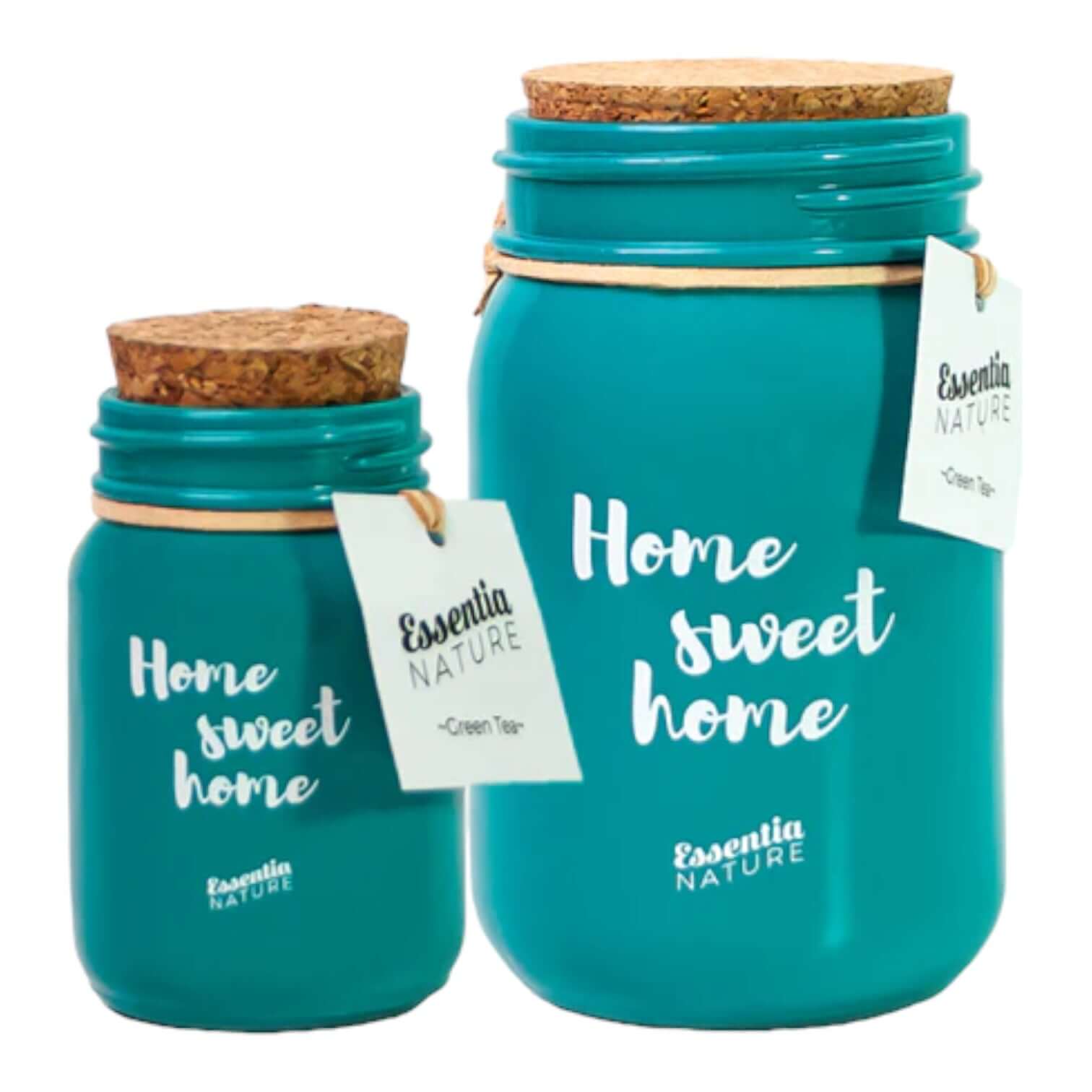 Essentia Nature Green Tea scented candles in teal jars with cork lids, labeled 'Home Sweet Home'.