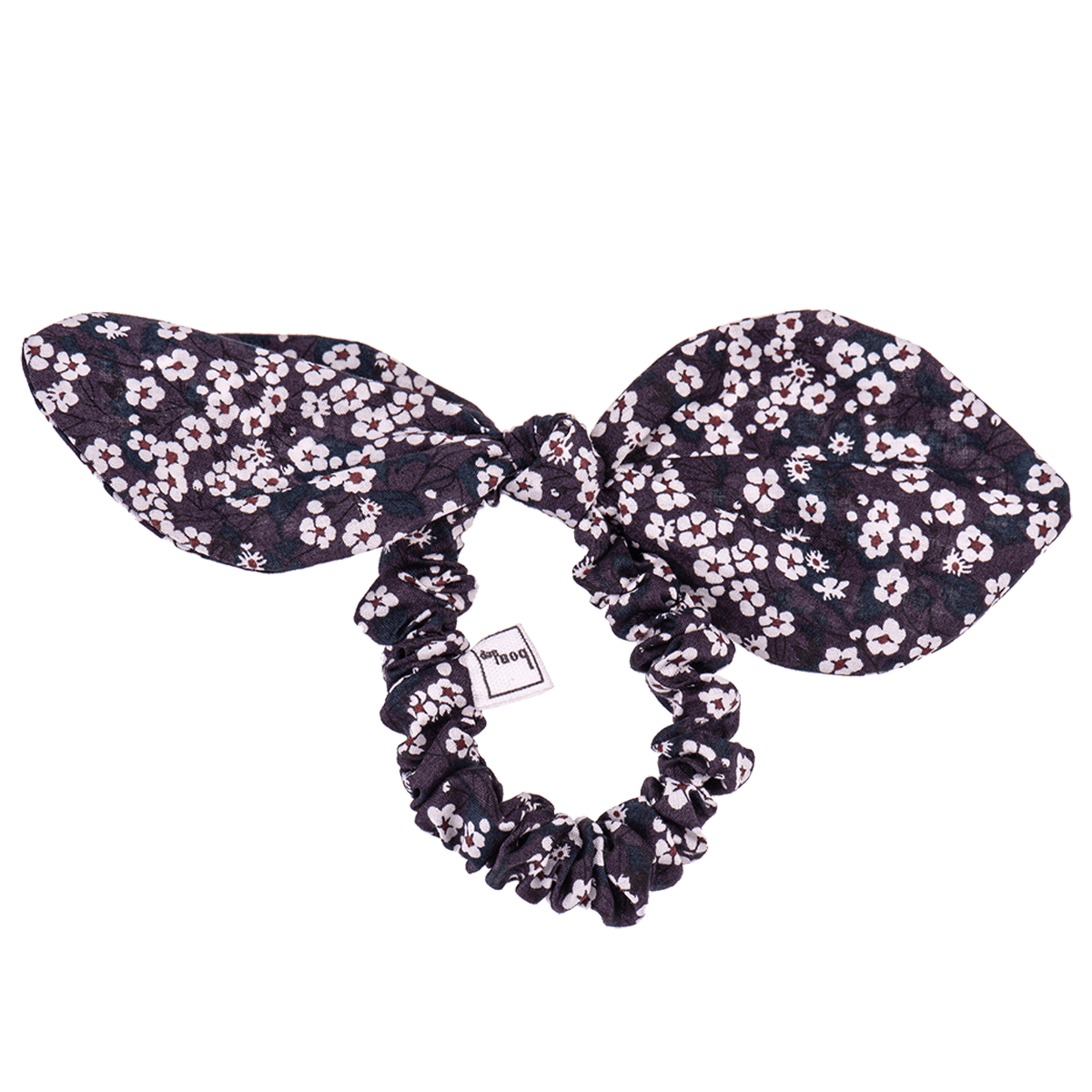 Fiocco per capelli Valeria in tessuti morbidi con design floreale elegante e dettagli vivaci.