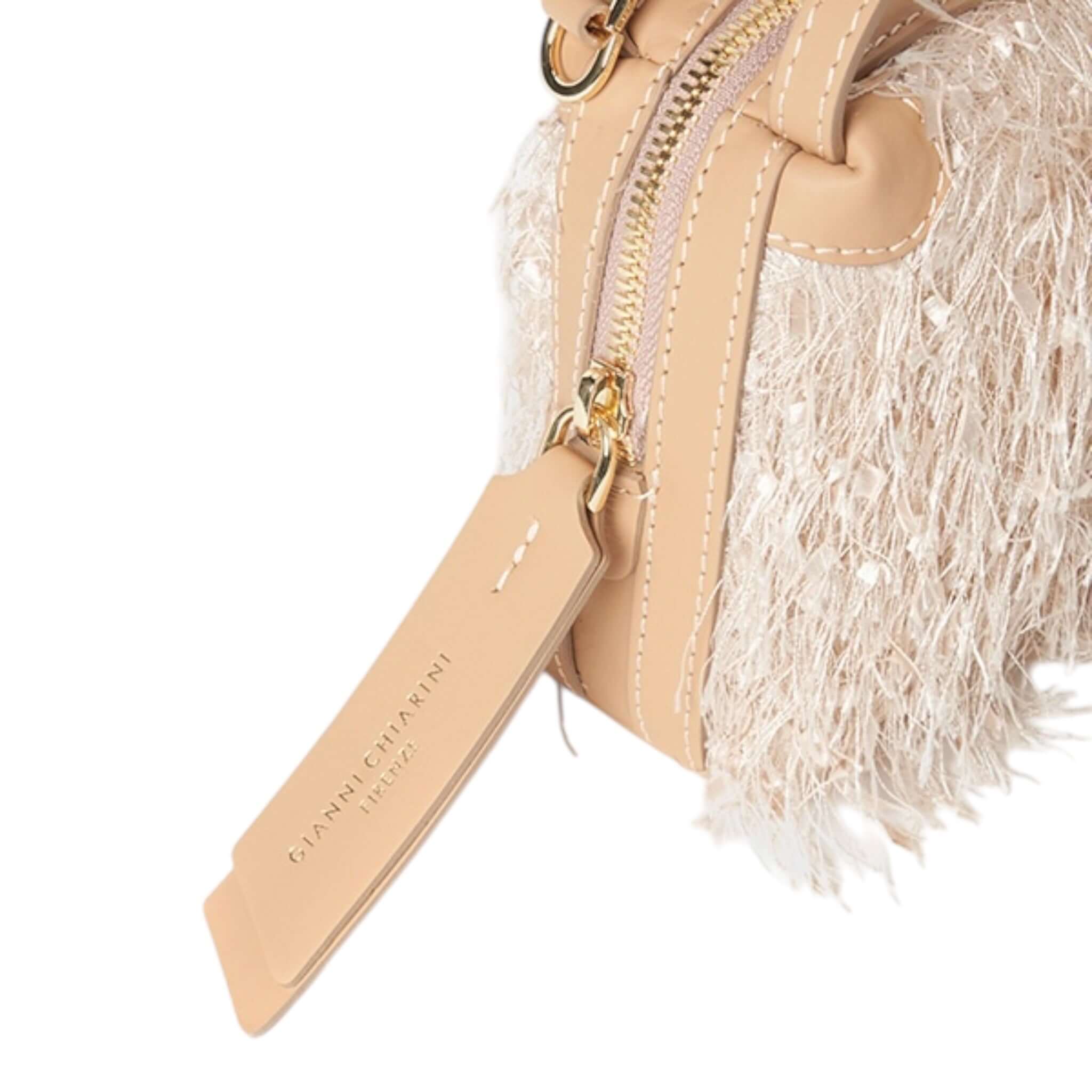 ALIFA by Gianni Chiarini, detailed view of the stylish hand bag with fringe and leather trims.