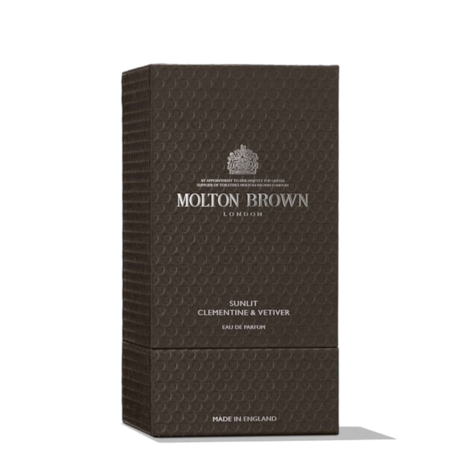 Molton Brown Sunlit Clementine & Vetiver eau de parfum pack, 100 ml, featuring elegant brown packaging.