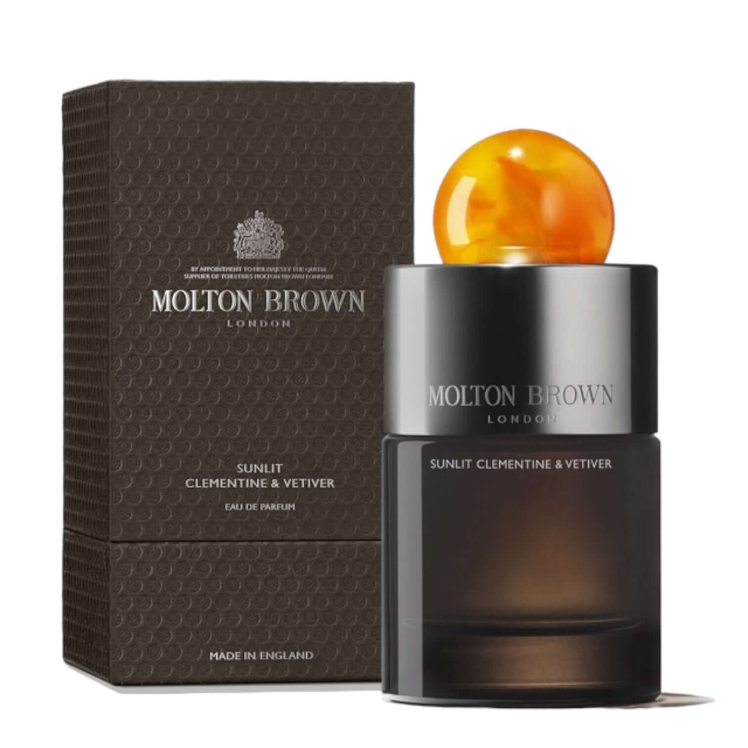 Molton Brown Sunlit Clementine & Vetiver eau de parfum 100ml in elegant packaging with a vibrant cap.