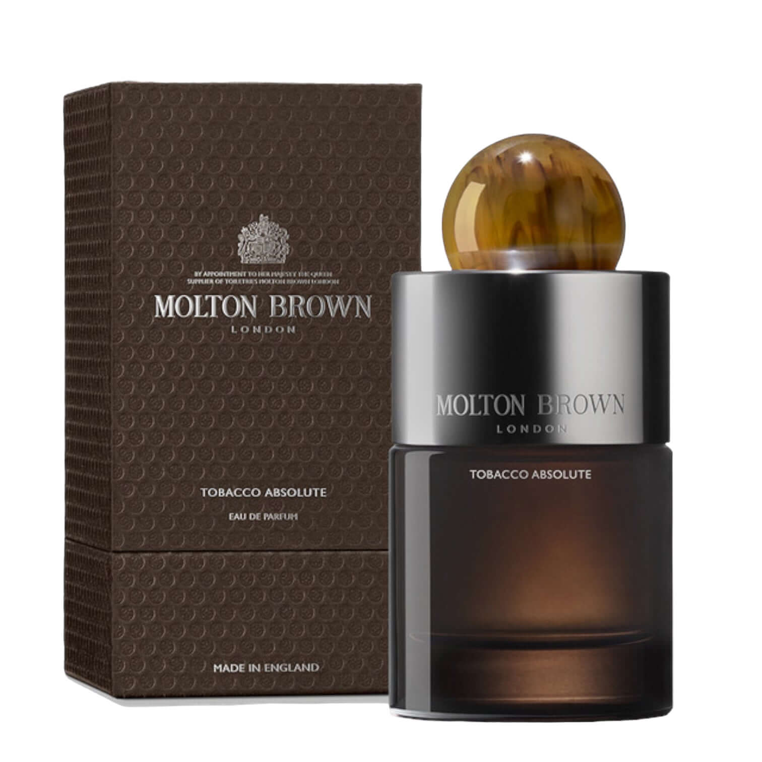 Tobacco Absolute Eau De Parfum by Molton Brown in elegant glass bottle with resin cap and stylish packaging.