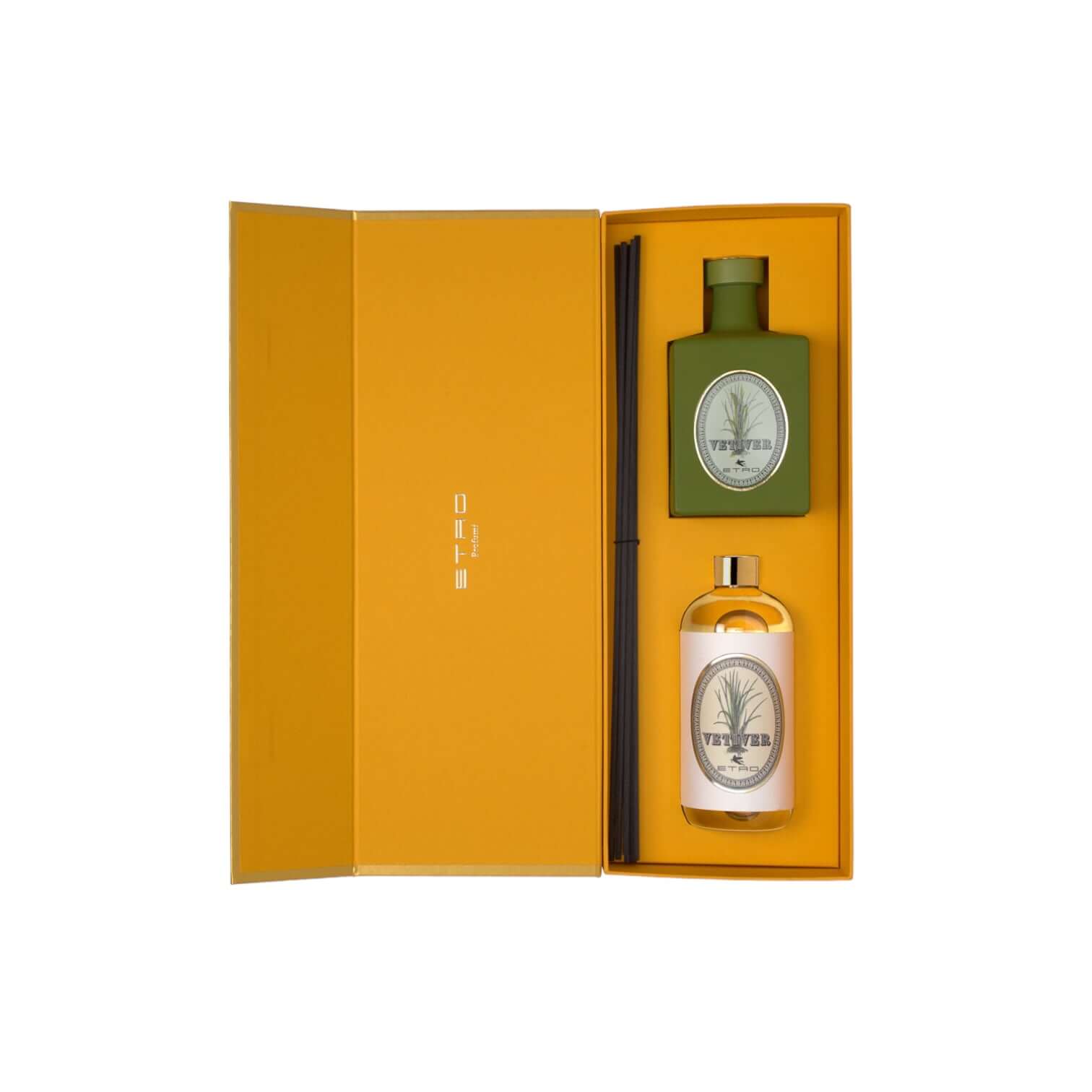 Vetiver Diffuser set in elegant yellow box, featuring green glass bottle, refill, and black reeds.