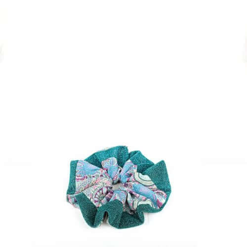 Nastro elastico in seta e lurex verde con fantasia fiori, ideale per accessori moda eleganti.