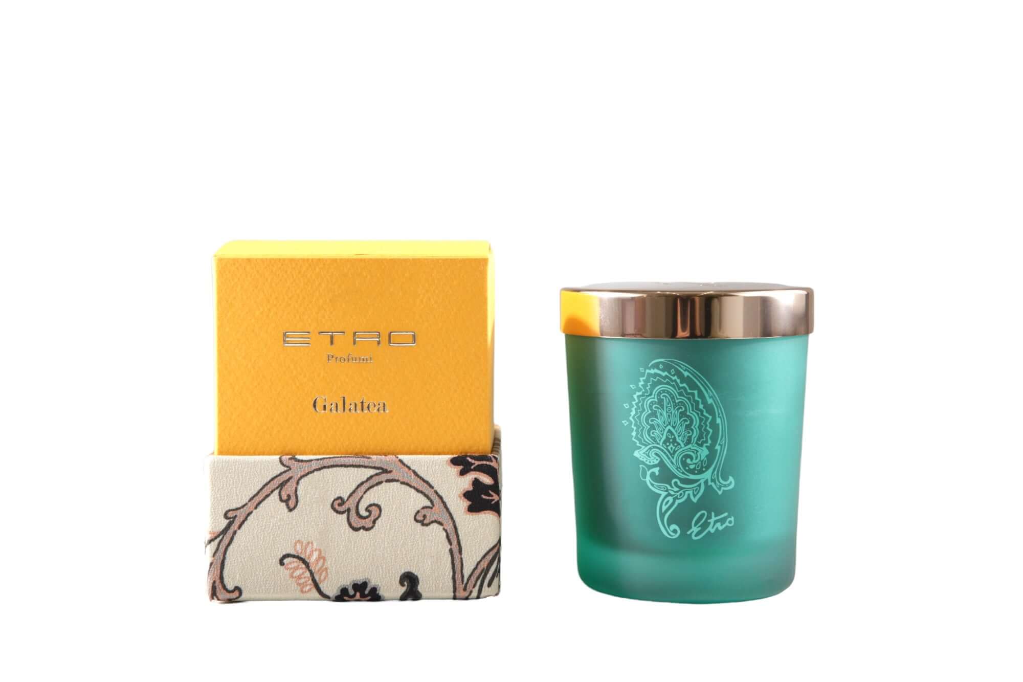 Galatea Candela in custom green glass by ETRO, featuring a gold lid and Pegaso symbol, with an elegant box.
