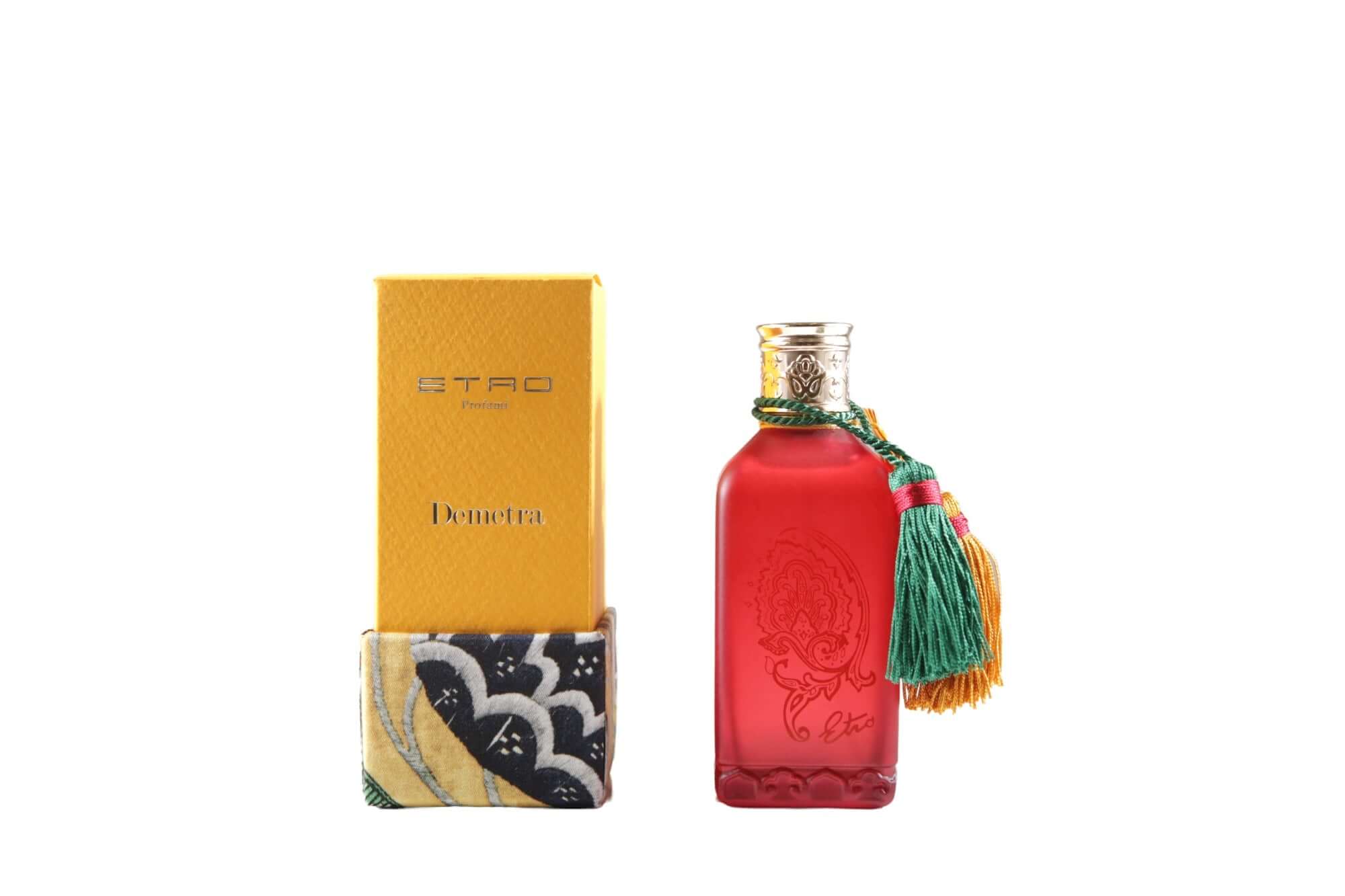 Demetra Diffusore Spray in bordeaux glass by ETRO, 100 ml, with ornate packaging and colorful tassel.